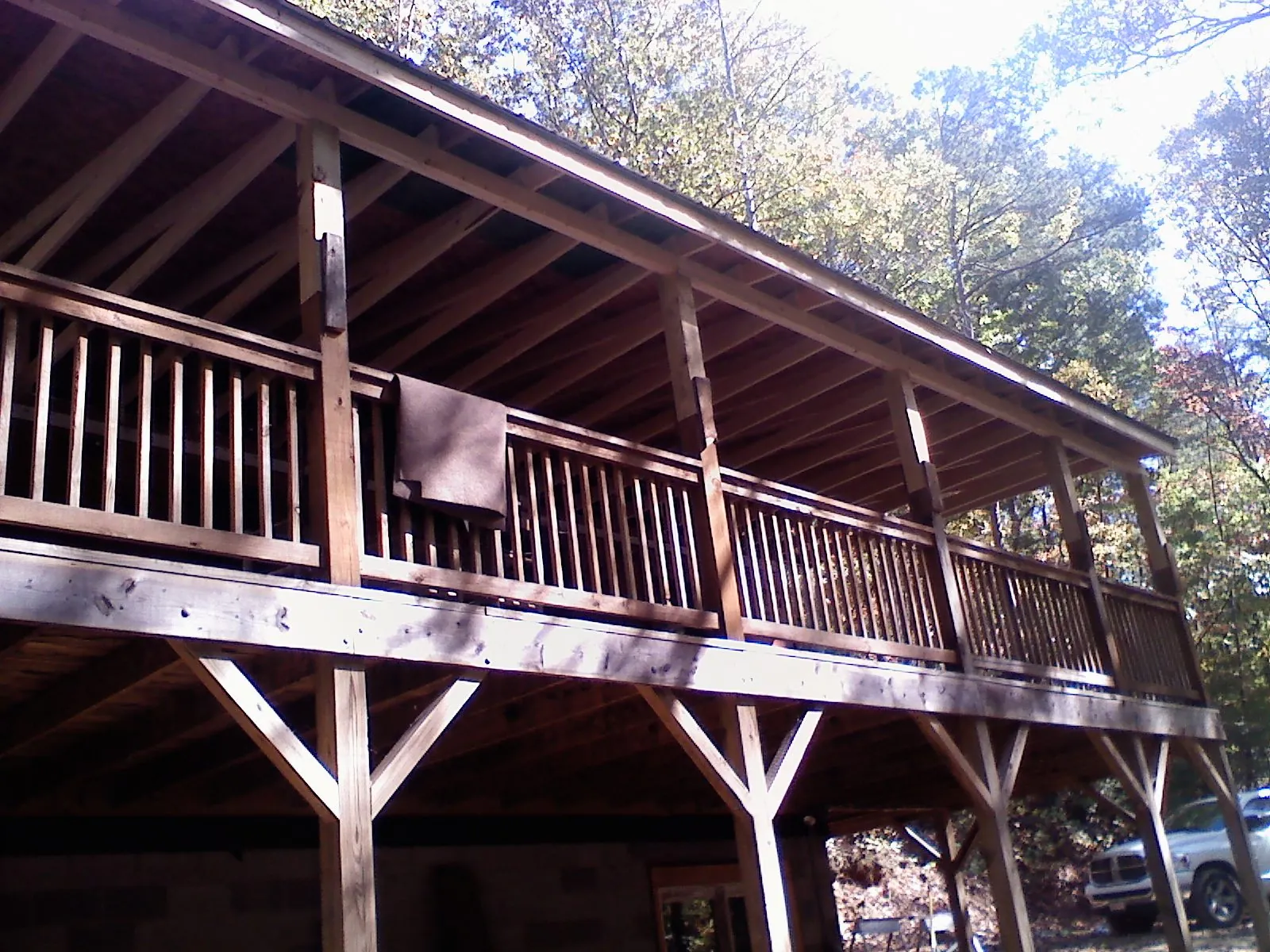 Timber framing under a new elevated porch and deck — Roof Leak Repair in Crapo by Roofing Brothers